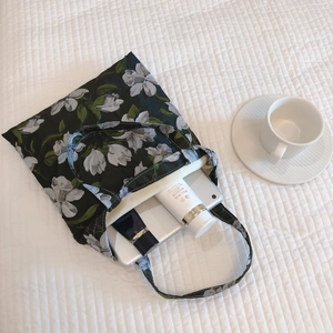 Elegant floral canvas tote bag with realistic flower patterns for daily use