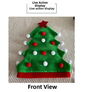Close-up of green Christmas tree hat with red pom-poms and top star decoration