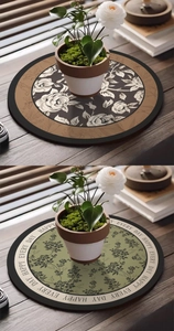 Detail of absorbent leather floral vase mats with vintage patterns and lettering