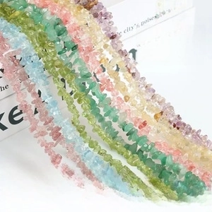 Mix of irregular natural gemstone beads including rose quartz and amethyst for jewelry making