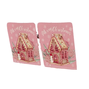 Pair of pink linen texture Christmas chair covers with Merry Christmas print on white background