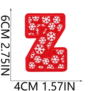 Detailed view of red embroidered letter Z patch with snowflake pattern and dimensions