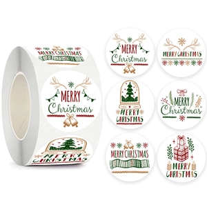 Roll of 500 Merry Christmas stickers with various round designs for holiday gift wrapping