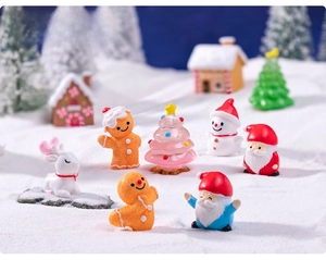 Miniature Christmas resin figurines set featuring Santa, deer and snowman in snow scene