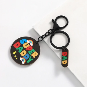 Colorful wooden Mother's Day keychain featuring Super Daddy and Dad rainbow print