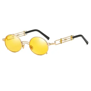 Retro steampunk round sunglasses with gold metal frame and yellow tinted lenses