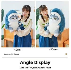 Detailed comparison of 40cm and 50cm shark cat plush toys in home setting