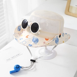 Detail of kids mesh sun hat with space print, attached sunglasses and blue whistle charm
