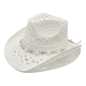 White wide-brim cowboy straw hat with hollow weave patterns and beaded trim for summer