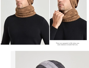 Detail of warm brown knit neck warmer and grey patchwork beanie hat for winter