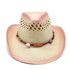 Hollow western cowboy straw hat with pink gradient brim and ethnic beaded band decoration