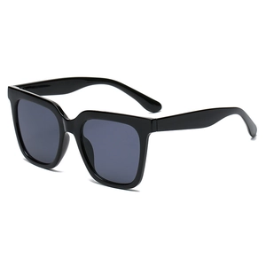 Classic oversized square sunglasses with black frames and dark grey lenses for sun protection