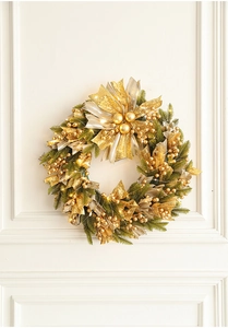 Close-up of 50cm Christmas wreath featuring gold bows, berries, and warm LED fairy lights