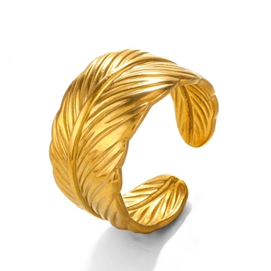 Adjustable golden stainless steel feather open ring with detailed metal texture