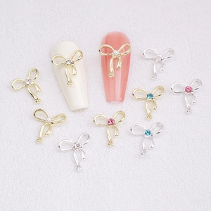Bowknot nail art alloy charms with rhinestones and pearls on golden and silver bases