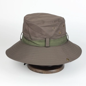 Waterproof outdoor boonie hat in tan with green ribbon and adjustable chin strap