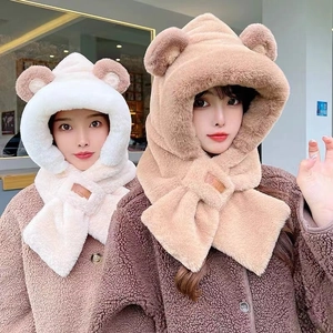 Detail of cute bear ear plush hooded scarf made of thick faux rabbit fur in beige and tan