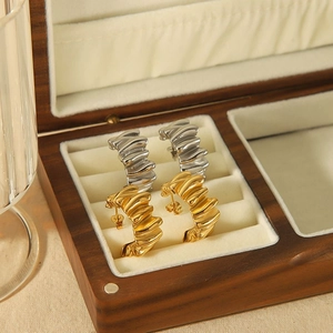 Orecchini vintage in acciaio al titanio oro e argento con trama a onde pieghettate