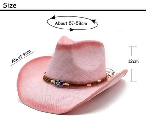 Pink straw cowboy hat with evil eye charm detail and dimensions showing height and brim
