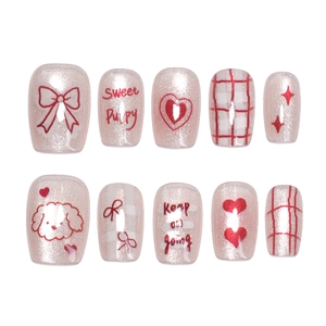 Sweet pink cat eye press-on nails set featuring cute puppy and heart patterns