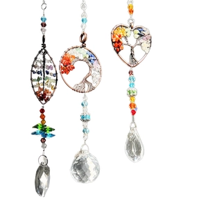 Three-piece Tree of Life crystal suncatchers with chakra stones and heart prisms