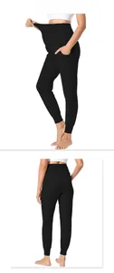 Detail view of high-waist maternity yoga pants with elastic belly support and side pockets