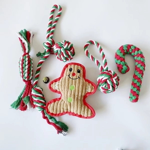 Detailed set of gingerbread plush dog toy and red-green cotton rope knots for pets