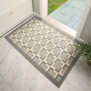 Macro detail of Nordic geometric rectangle doormat with durable fabric texture