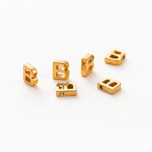 Detailed view of six 18k vacuum gold-plated alphabet B beads for DIY jewelry making