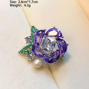Fashionable floral brooch with purple and green stones, zircon inlay and a pearl drop