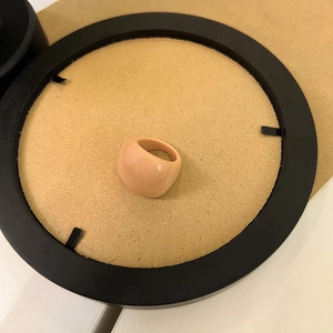 Minimalist beige resin square ring with smooth finish for a modern vacation style look