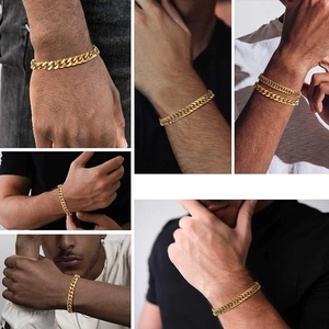 Detail view of a men's gold Cuban link chain bracelet shown through lifestyle model shots