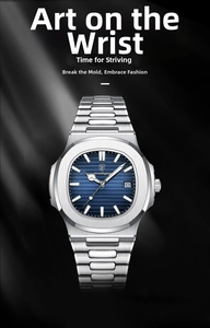 Macro shot of blue textured dial and silver stainless steel watch with date display