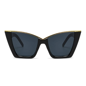 Modern cat eye sunglasses with glossy black frame and V-shaped gold metal trim