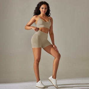 Close-up of seamless ribbed waistband on high-stretch yoga shorts and matching sports bra