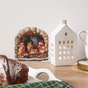 3D Christmas mouse hole wall sticker showing cute hamsters feasting on a white wall
