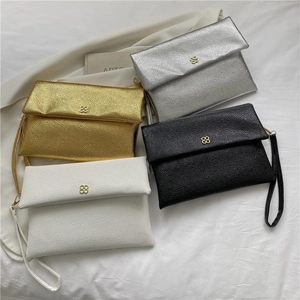 Litchi texture envelope clutch bags in four colors with clover logo and wrist strap