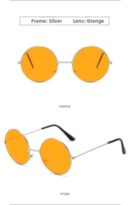 Detail view of retro round sunglasses with silver metal frame and orange tinted lenses