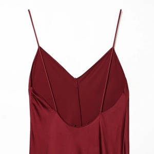 Elegant burgundy satin slip dress with deep V-back design and thin straps for women