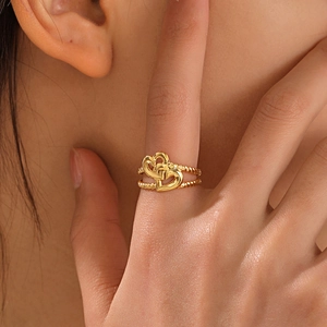 Minimalist double heart stainless steel ring with spiral texture in golden finish