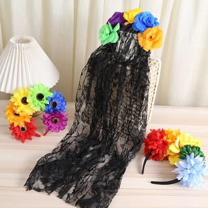 Detail of colorful daisy headband and black lace veil hair accessories for bohemian vacation