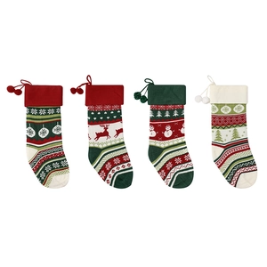 Set of 4 knitted Christmas stockings with reindeer and snowflake patterns for tree decor