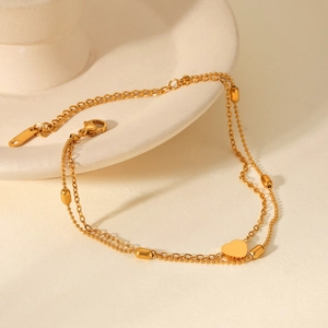 Double-layered 18K gold plated stainless steel anklet with heart pendant and oval beads