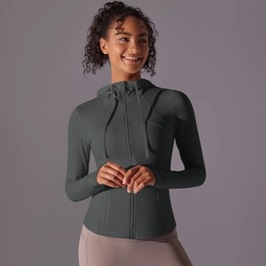 Detail of slim fit hooded sports jacket with zip closure and thumbhole cuffs