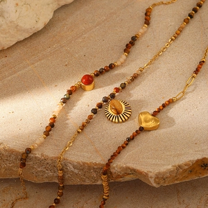 Bohemian gold plated stainless steel necklace with natural tiger eye stone and sun charms