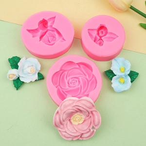 Detailed pink silicone molds for 3D rose and calla lily crafts with finished flower models