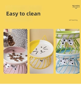 Close-up of ceramic cat bowls with metal stands and polka dot bows in three colors