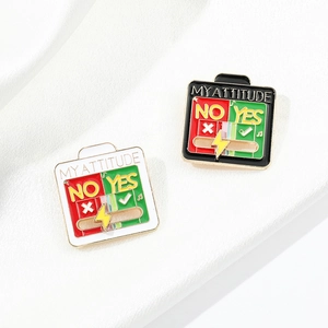 Detail showing the sliding toggle feature on white and black metal mood badges