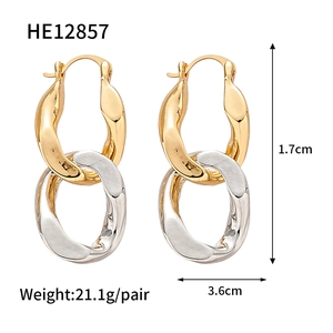 Detailed view showing two-tone gold and silver twisted geometric link earrings size specs