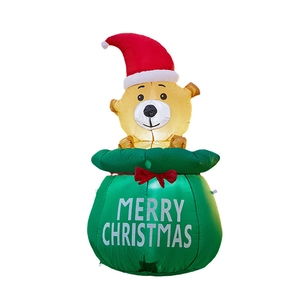 Inflatable Christmas bear in green gift bag outdoor decoration with Merry Christmas text